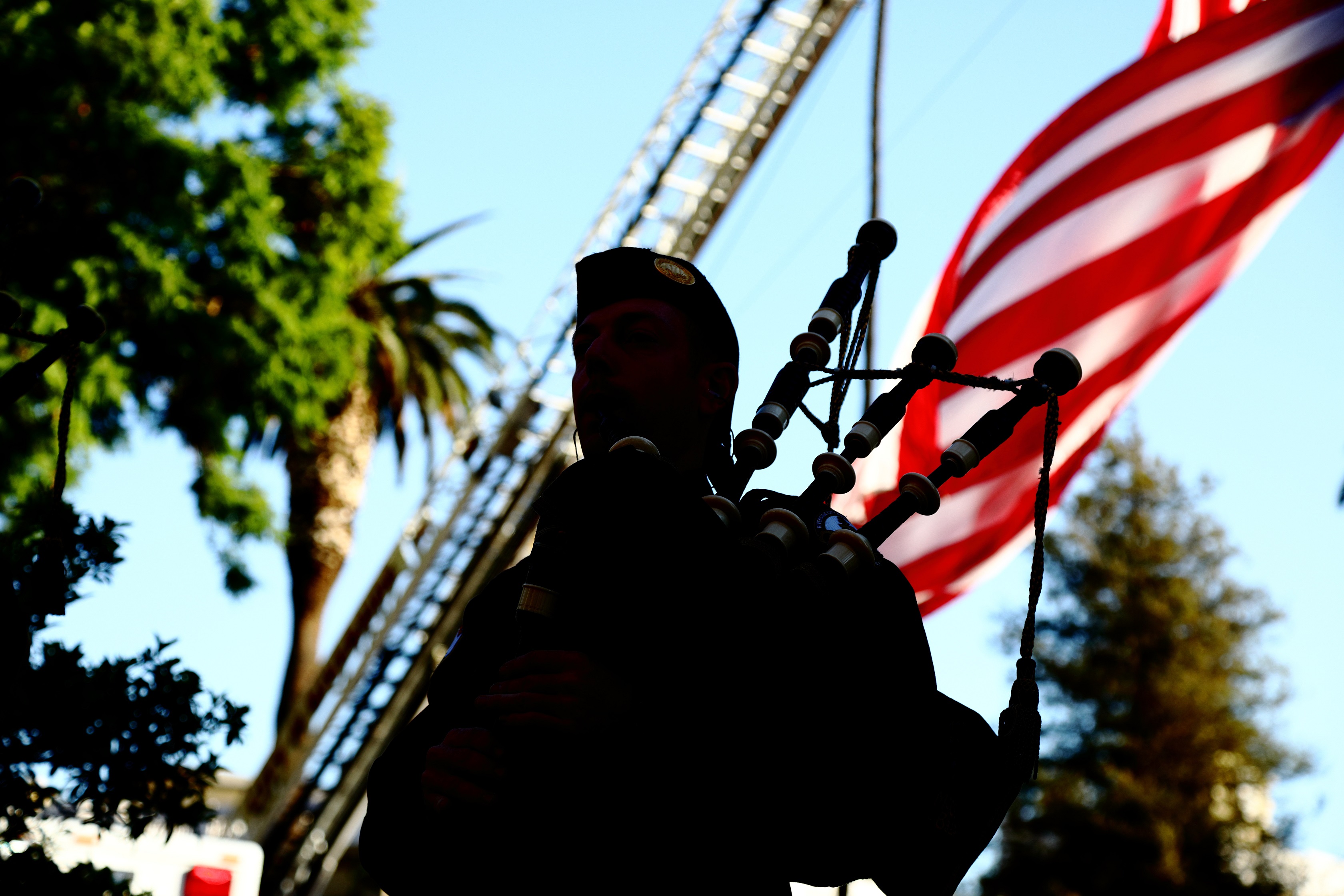Bagpiper and US flag